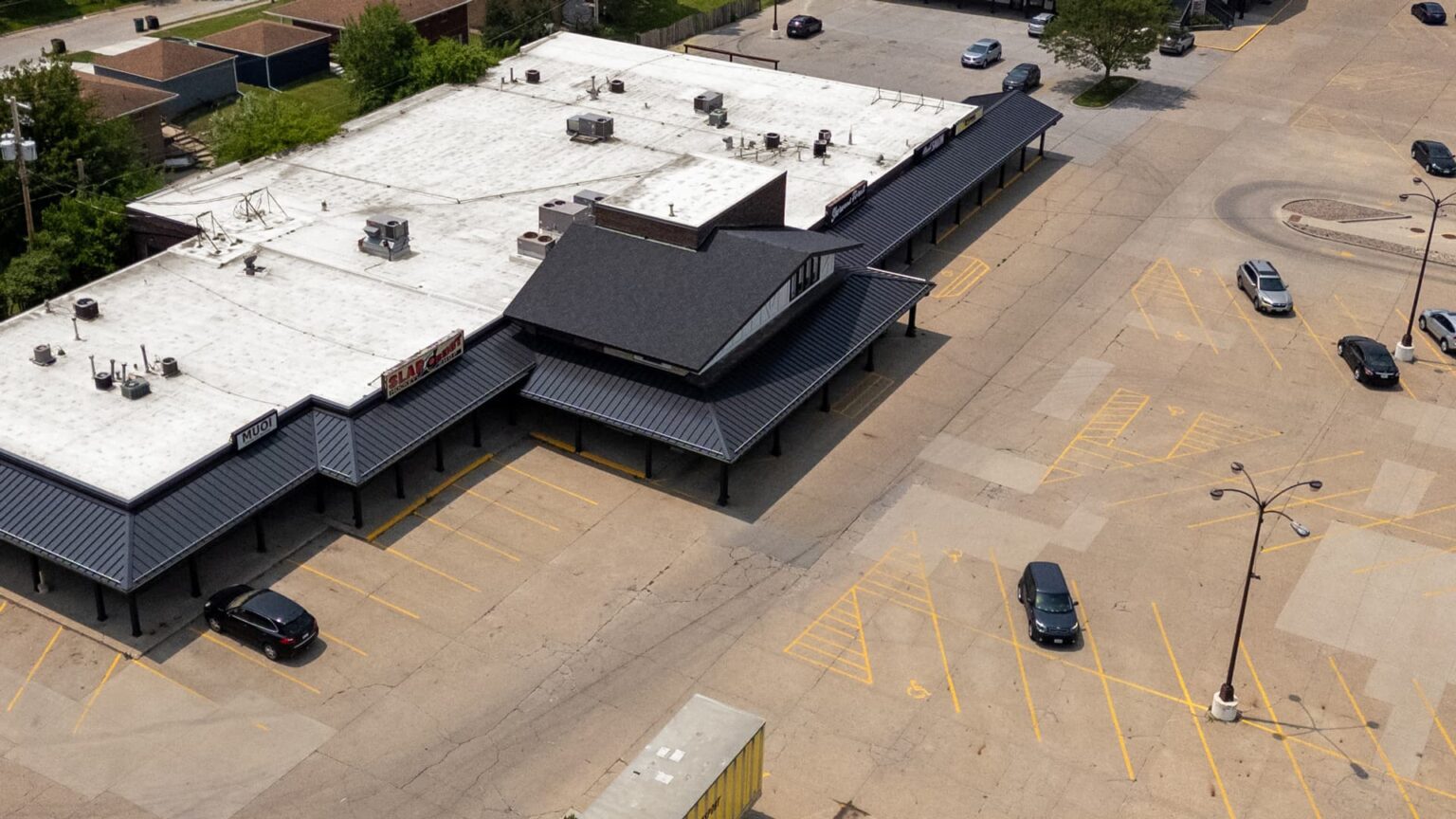 sherwood-forest-arial2-roof-installation-certainteed-shingles-wolf-roofing-windsor-heights-min Elevated view of Sherwood Forest center featuring detailed roof improvements