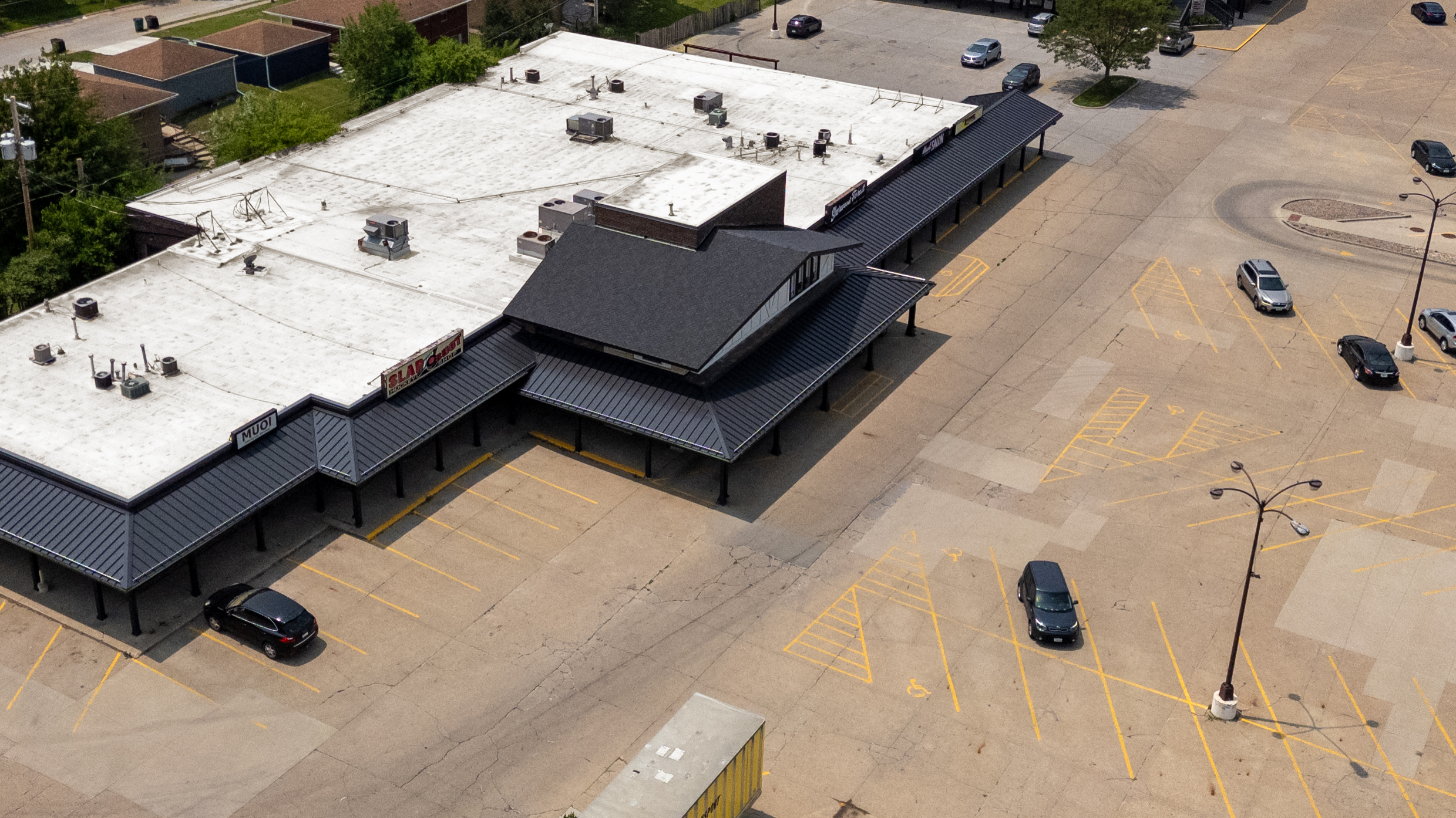 Elevated view of Sherwood Forest center featuring detailed roof improvements