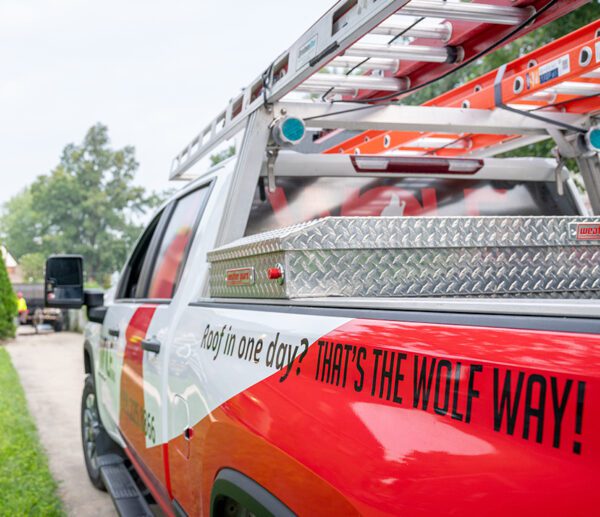 Wolf Roofing truck at a home in Central Iowa