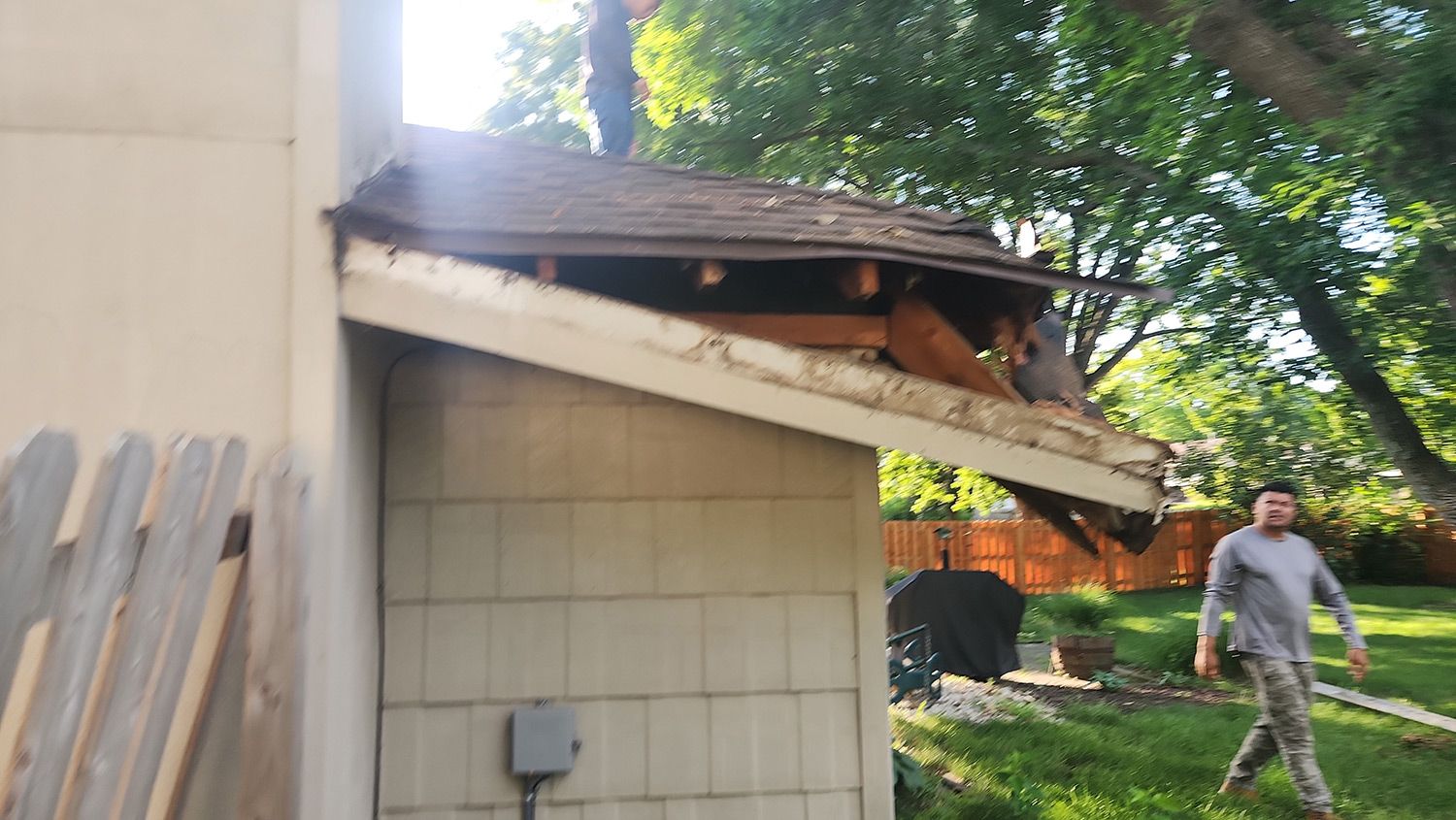 before A damaged roof before Wolf Roofing began repairs