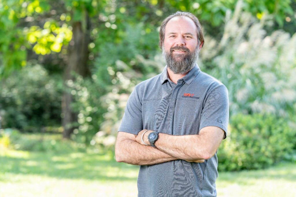 Jon Van Dis, President of Wolf Roofing Jon Van Dis, President of Wolf Roofing, standing outdoors