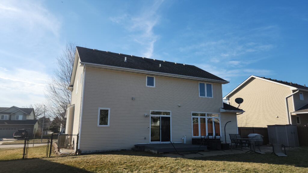 Back of an Ankeny home before its roof replacement