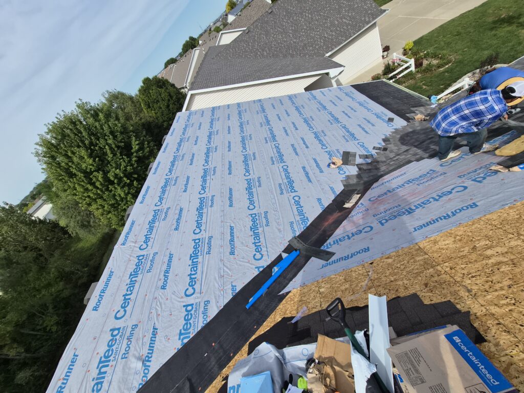 CertainTeed RoofRunner Underlayment Installation, Waukee Wolf Roofing crew installing CertainTeed RoofRunner underlayment in Waukee