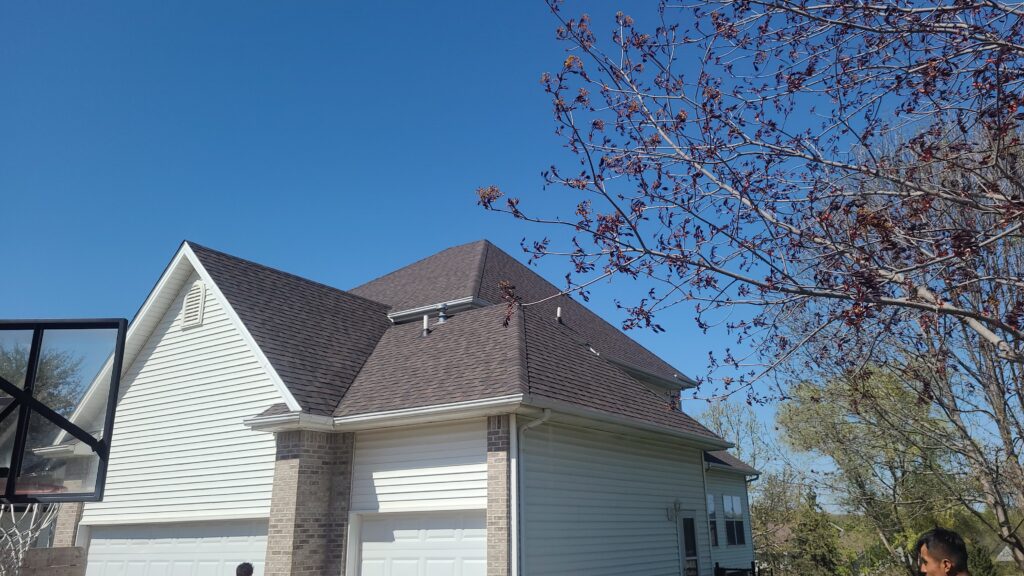 Johnston Home New Roof Exterior Johnston, Iowa home with a new CertainTeed Landmark Pro roof in Shenandoah