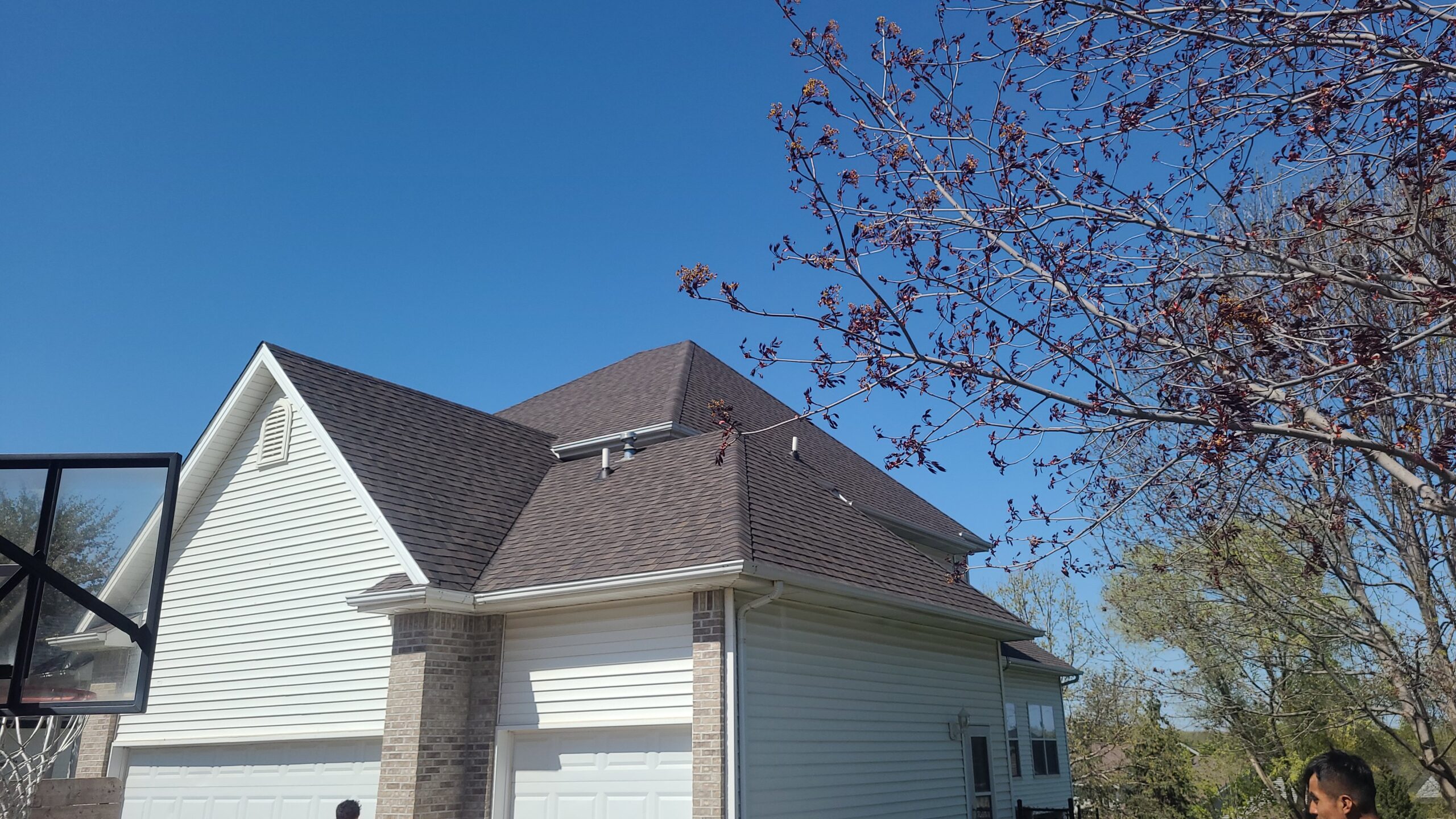 Johnston Home New Roof Exterior Johnston, Iowa home with a new CertainTeed Landmark Pro roof in Shenandoah