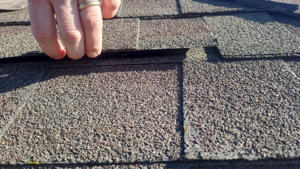 Worn Roof Shingles Before Worn roof shingles on a Johnston, IA home before replacement