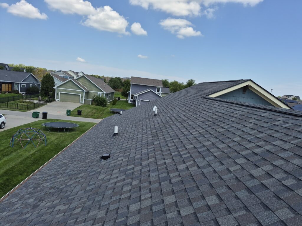 New Driftwood Impact-Resistant Roof, Ankeny Neighborhood New impact-resistant Driftwood roof overlooking an Ankeny neighborhood