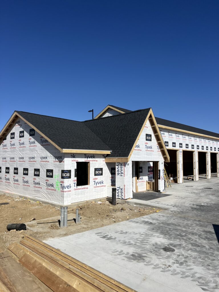 New commercial building with a steep-slope shingle roof in Iowa