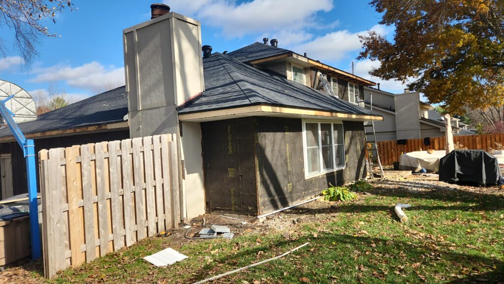 Iowa home with a new roof and exterior restoration underway after a storm