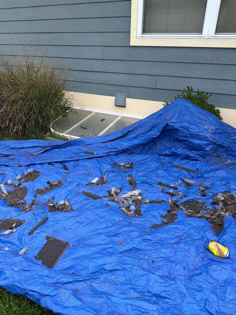 Tarps Protecting Landscaping During Roof Tear-Off, Ankeny Tarps protecting landscaping during roof tear-off in Ankeny