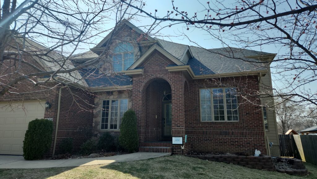 Waukee Brick Home Roof Replacement, CertainTeed Landmark Colonial Slate Waukee hail damage roof replaced with CertainTeed Landmark Colonial Slate on a classic red brick home