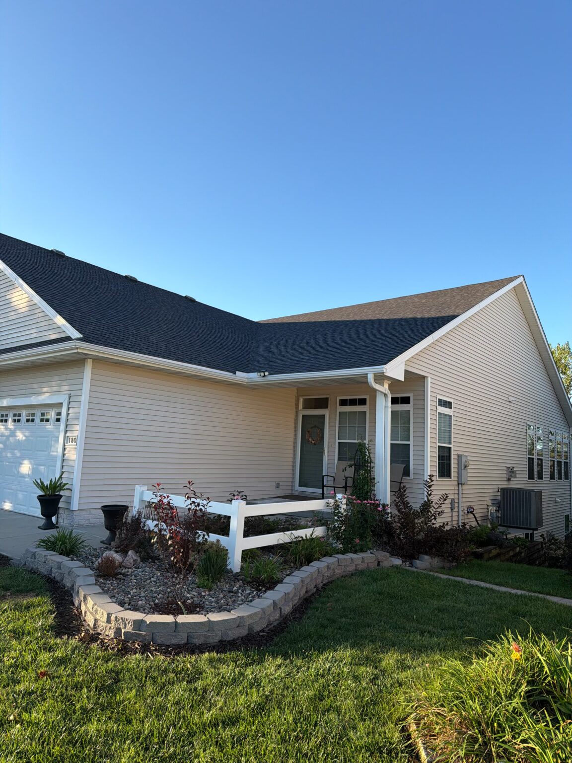 Waukee Twin Home Roof Replacement, CertainTeed Landmark Pro Driftwood Waukee twin home with a new CertainTeed Landmark Pro Max Def roof in Driftwood