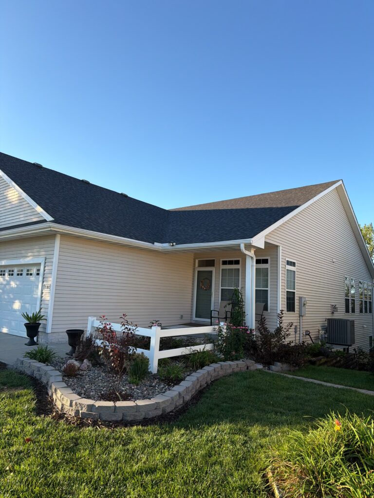 Waukee Twin Home Roof Replacement, CertainTeed Landmark Pro Driftwood Waukee twin home with a new CertainTeed Landmark Pro Max Def roof in Driftwood