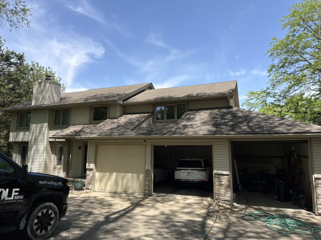 Front of Home Before Roof Replacement Front of a West Des Moines home with its old roof before replacement