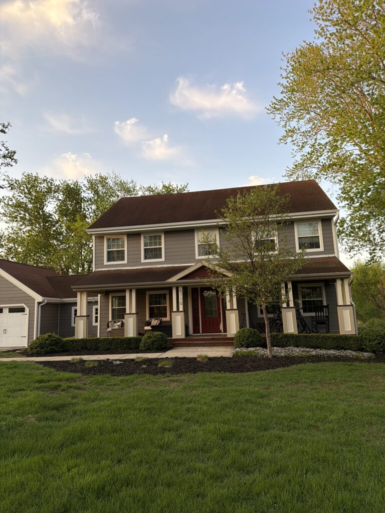 Red Roof Before Replacement West Des Moines home with its original red roof before replacement