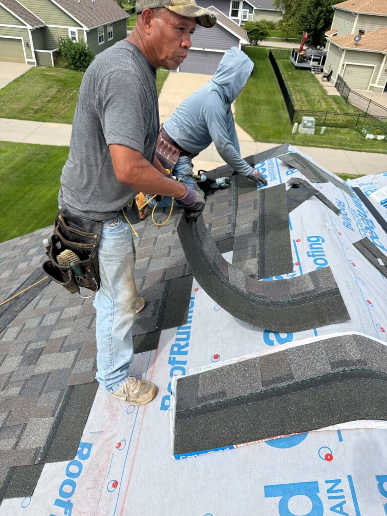 Wolf Roofing Crew Installing NorthGate Shingles Wolf Roofing crew installing NorthGate ClimateFlex shingles