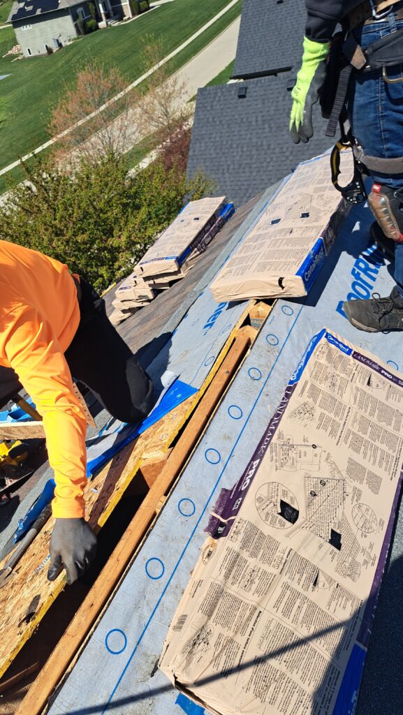 Wolf Roofing Crew Installing Underlayment Wolf Roofing crew installing underlayment in Johnston, IA