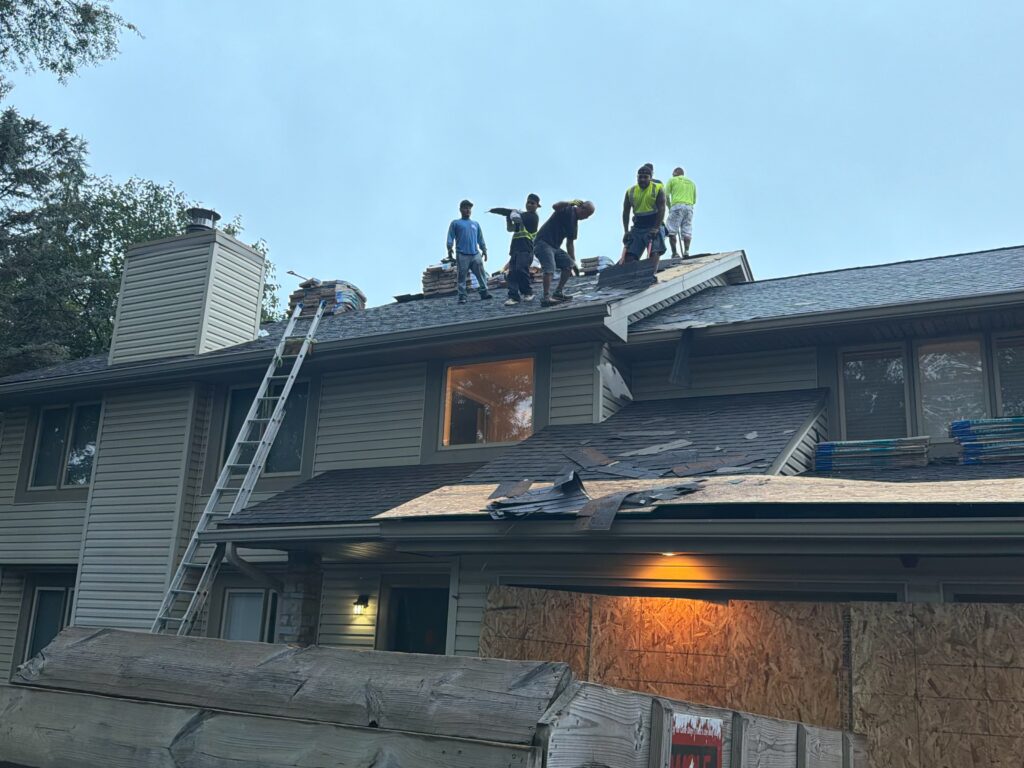 Wolf Roofing Crew West Des Moines Wolf Roofing crew on a roof replacement in West Des Moines, IA